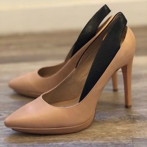 Beautiful BCBG pumps. Neutral with black croc texture detail in back.